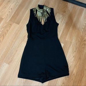Black Romper with Gold Embellishments